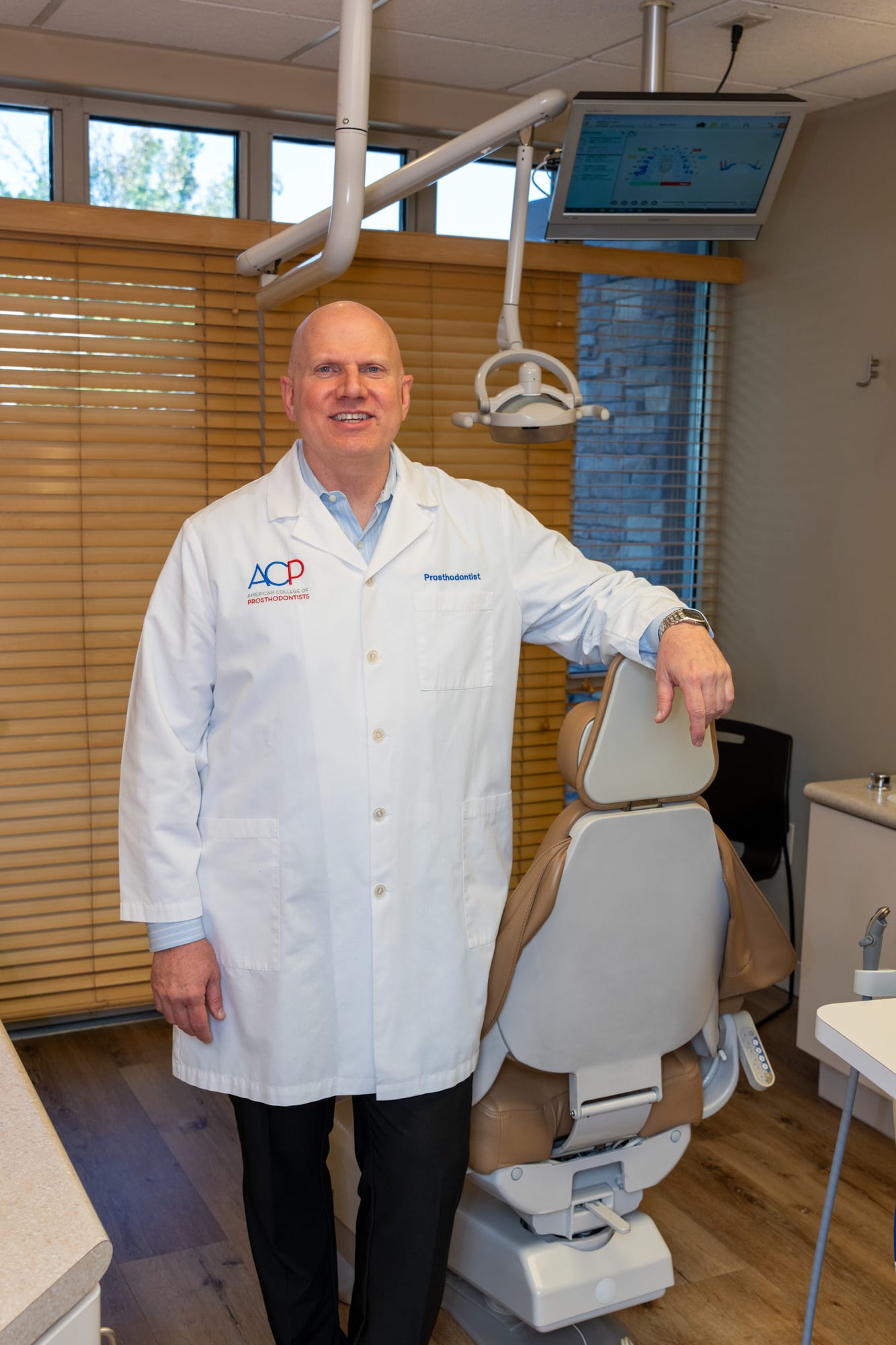 Dr. Rodney L Andrus, DDS, MS, FACP, in the practice's operatory